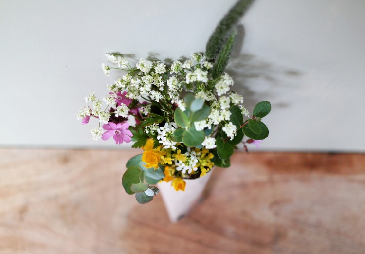 Tiny bouquet of mixed wild meadow flowers