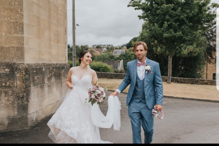 Bride and groom taking a walk together alone after their wedding ceremony.