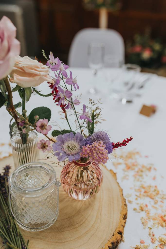 Wedding table centrepiece flowers by The Honey Seeker Floral Design and photograph by Charlotte Razzell Photography