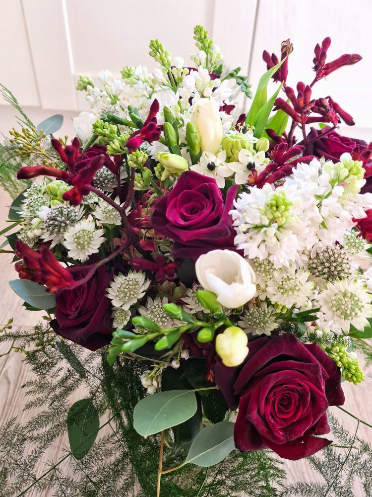 Bridal bouquet in white and red, pre-drying