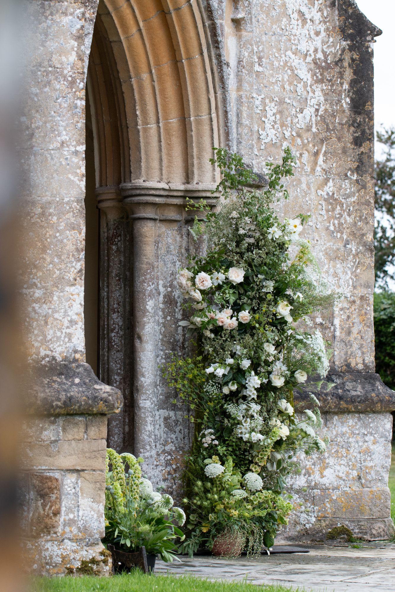 St. Mary's Church flower arch at North Cadbury Court in Somerset. Flowers by The Honey Seeker Floral Design