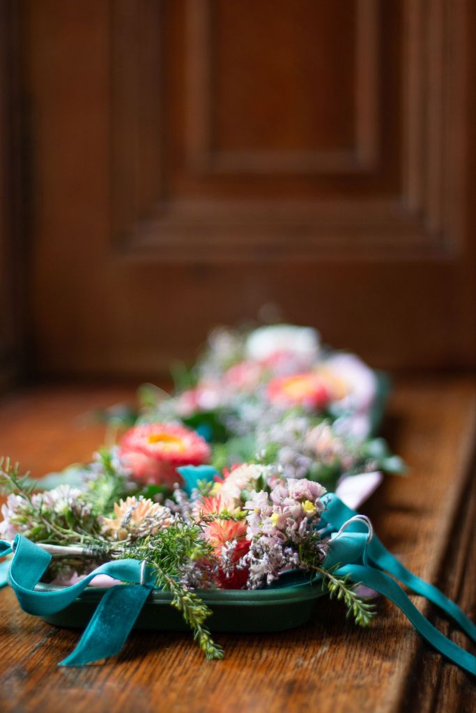 Buttonhole arrangements at Orchardleigh estate, wedding venue in Frome, Somerset, Flowers by The Honey Seeker Floral Design