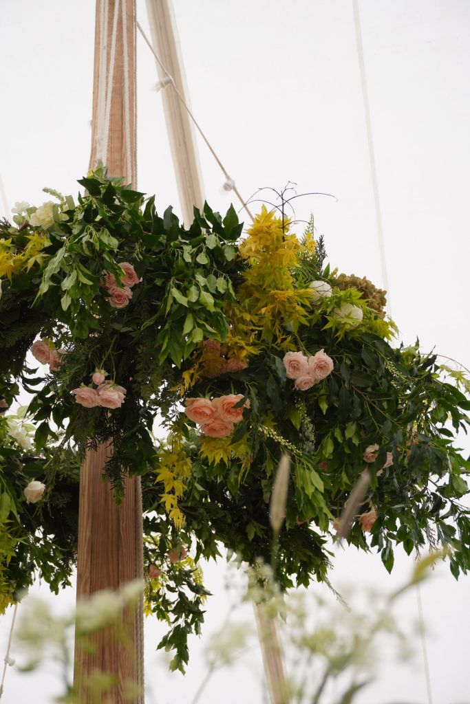 Floral hoop from a marquee wedding in Somerset, Archers Marquees, and Orinta Fowler Photography